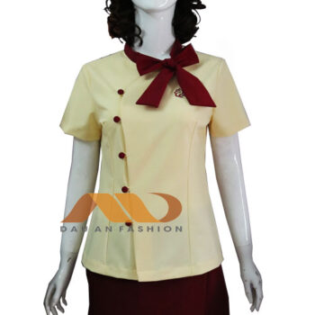 Đồng phục nhân viên đầm vàng thắt nơ